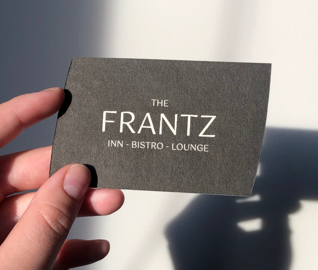 dark brown Frantz business card